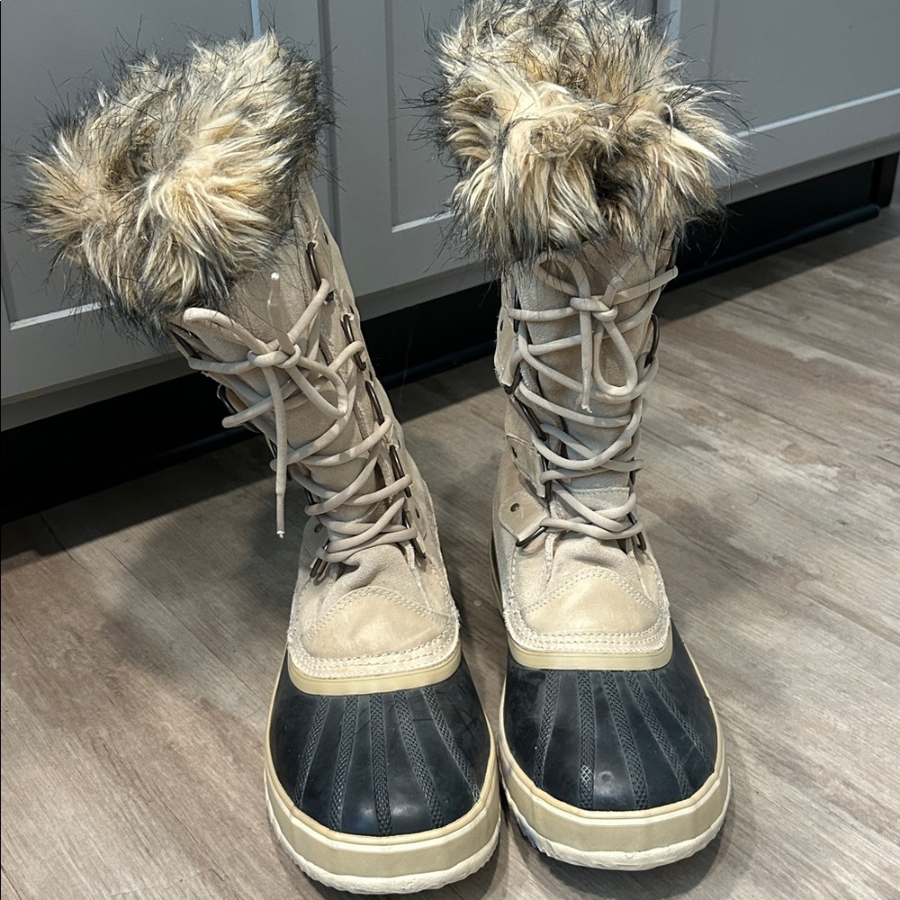 Sorel Tan and Black Winter Boots